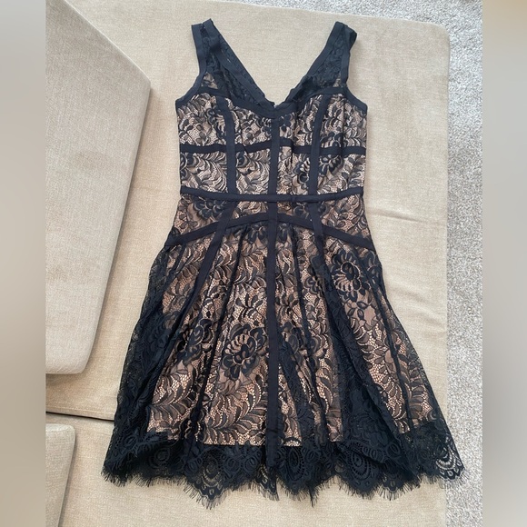 bebe Dresses & Skirts - Bebe Black Lace Overlay Dress